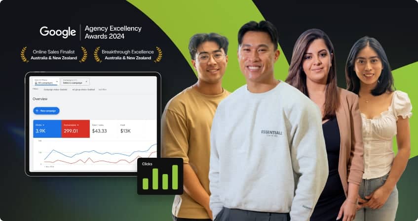 four click click media team members standing together in the norwest office with natural light, each holding google ads certifications and smiling at the camera.