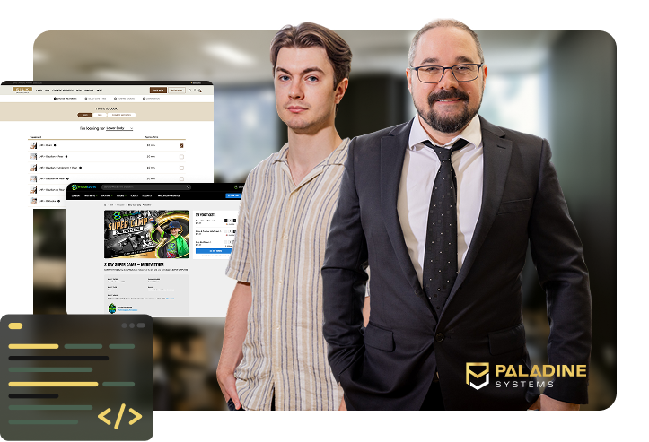 two members of the paladine systems team standing in the click click media office with screenshots of a custom clinic booking system and an event registration platform, with code editor icons and the paladine systems logo.