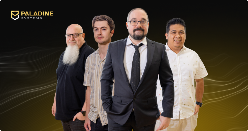 four members of the paladine systems development team standing together with the paladine systems logo on a dark background.