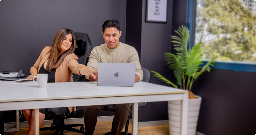 office photoshoot, sydney office with youtube ad campaign open on computer.