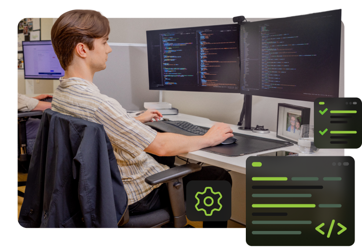 office photoshoot showing mark working on a php development request.