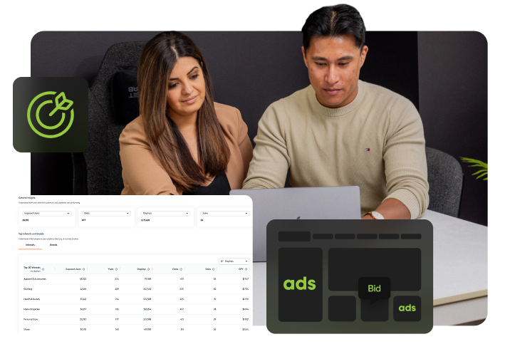 office photoshoot showing team members working on a programmatic ad campaign.